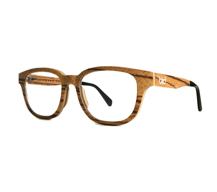 Corner view of eco friendly glasses frame made with light wood 