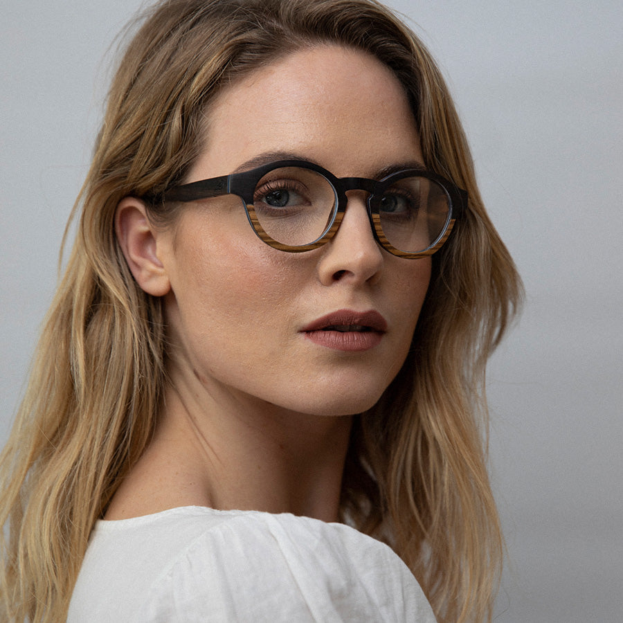 Woman wearing Round wooden glasses for optical lenses 