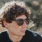 Male wearing Wooden sunglasses with grey polarised lenses