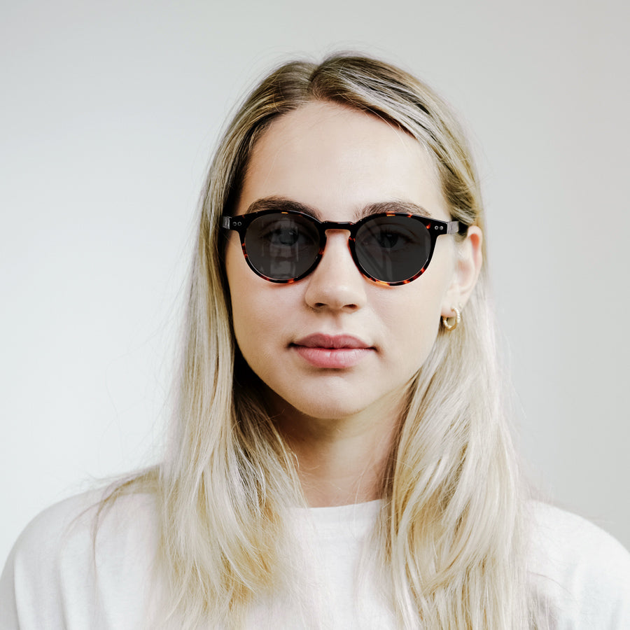 Girl wearing eco bio acetate tortoiseshell sunglasses 